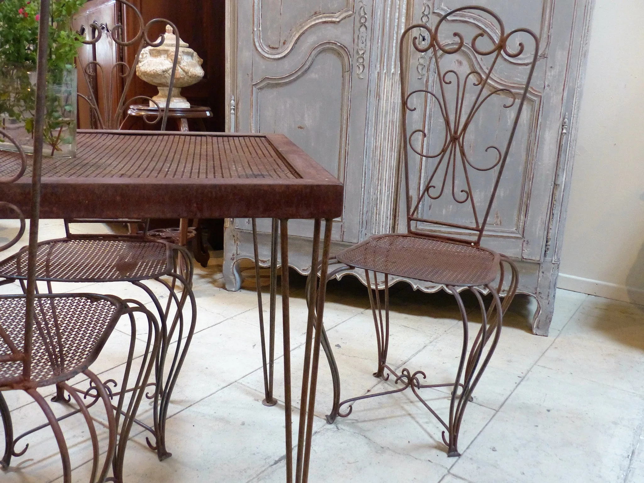 French garden table setting with four chairs