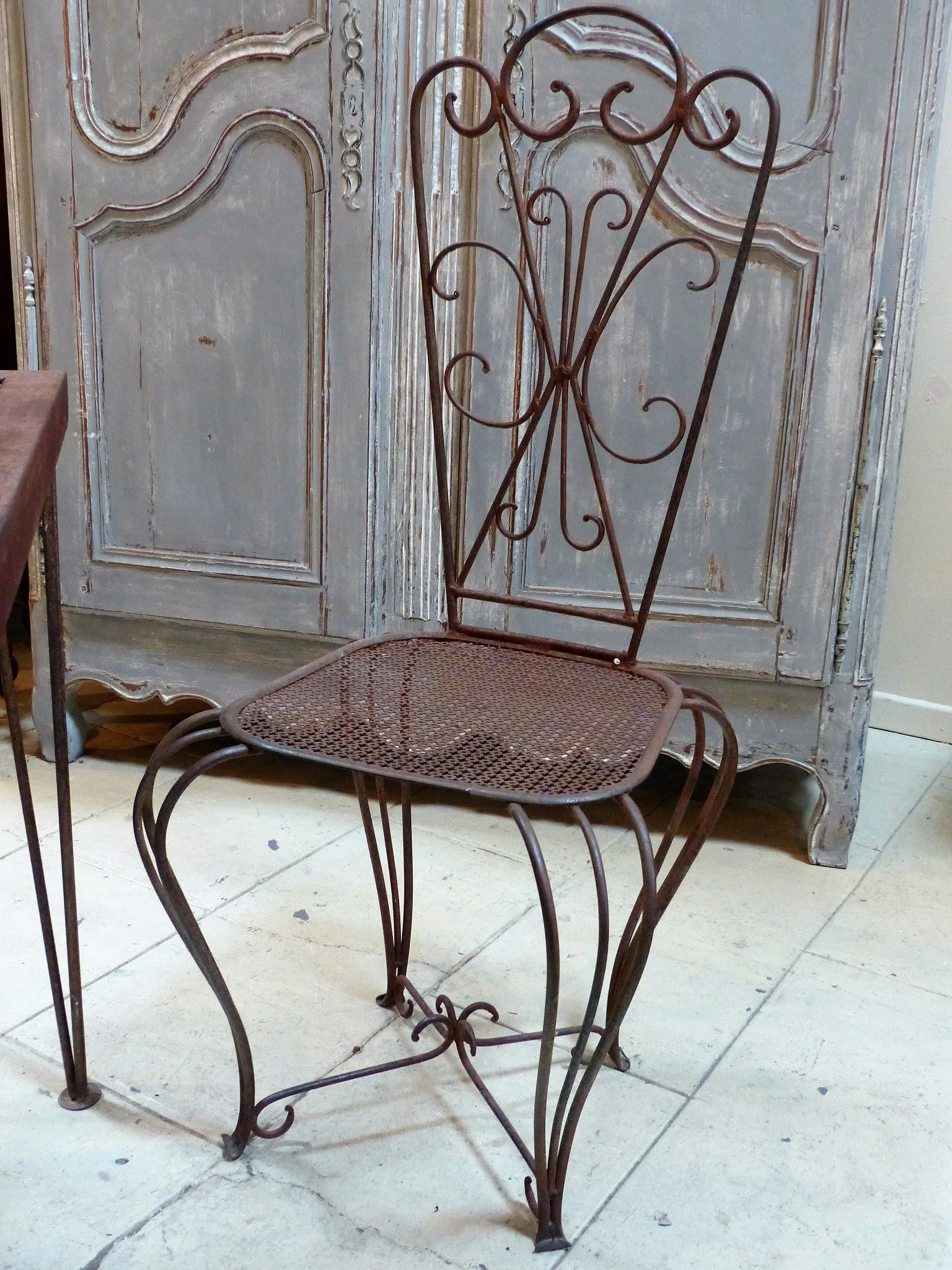 French garden table setting with four chairs