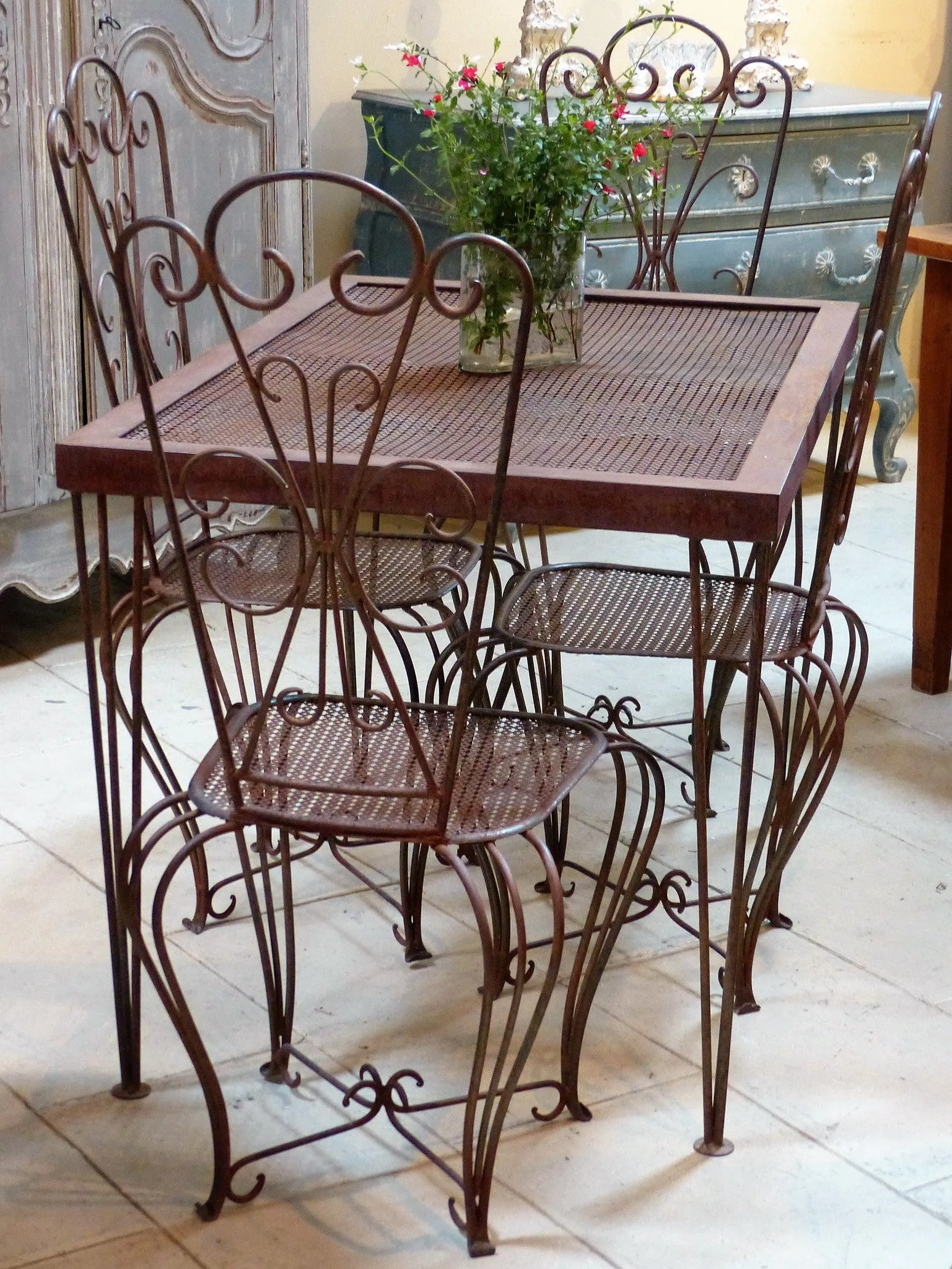 French garden table setting with four chairs