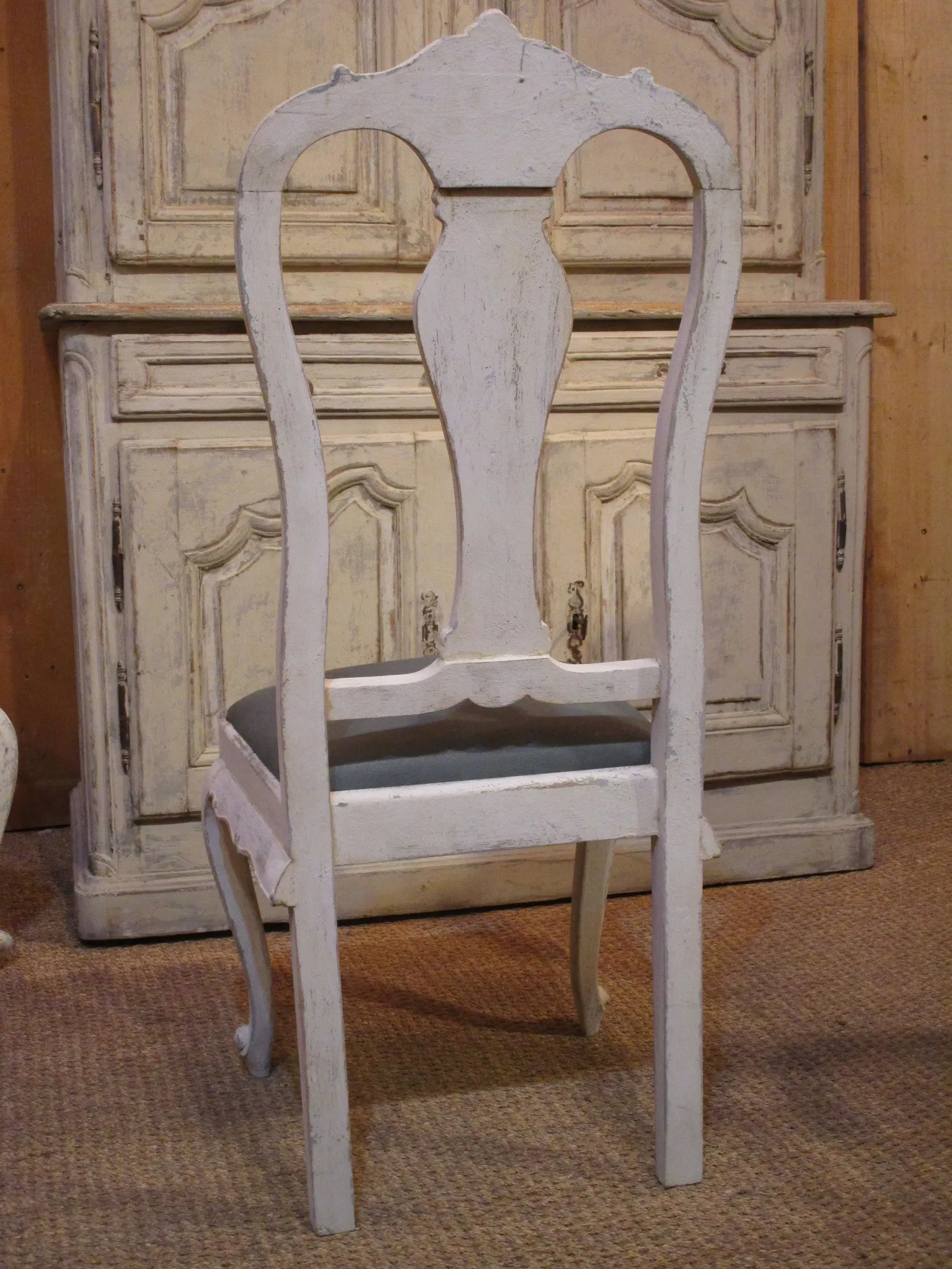 Set of four oak Chippendale dining chairs