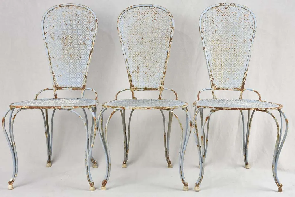 Set of six 1950s perforated garden chairs with lavender blue patina