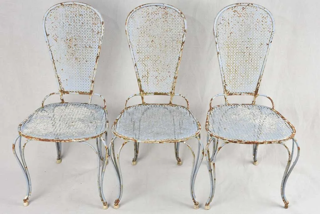 Set of six 1950s perforated garden chairs with lavender blue patina